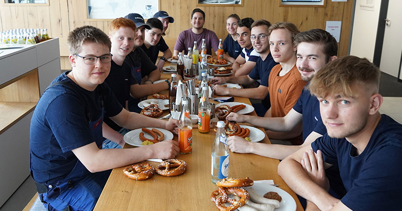 The graduates reviewed their training at a joint breakfast The graduates reviewed their training at a joint breakfast